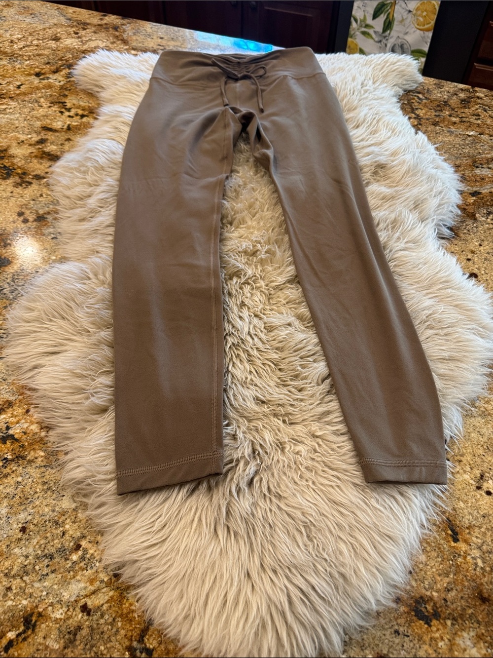 Athleta cinched waist leggings. Size small brownish color. Like new!